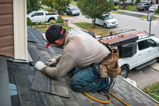 Professional Roofing technician working in East Taunton, MA